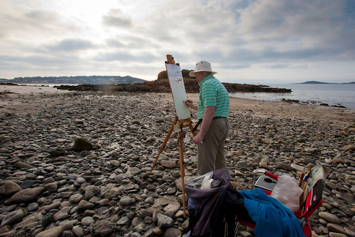 Stephen painting 'en plein air' at Porthloo beach, St Marys, Isles of Scilly