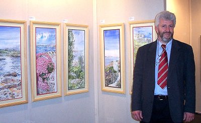 Stephen with some of his paintings